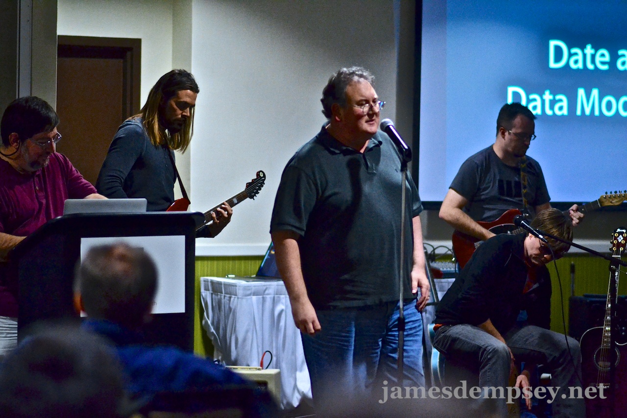 James Dempsey sings Modelin' Man while backed by Daniel Steinberg, Rusty Zarse and Brandon Alexander