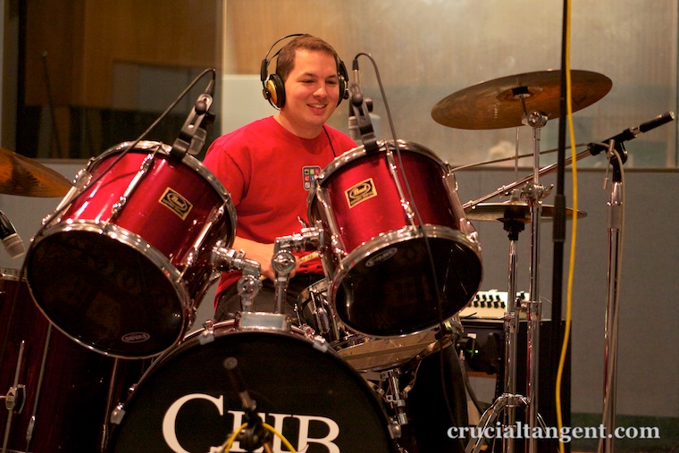 Raleigh Ledet playing the drums in the studio