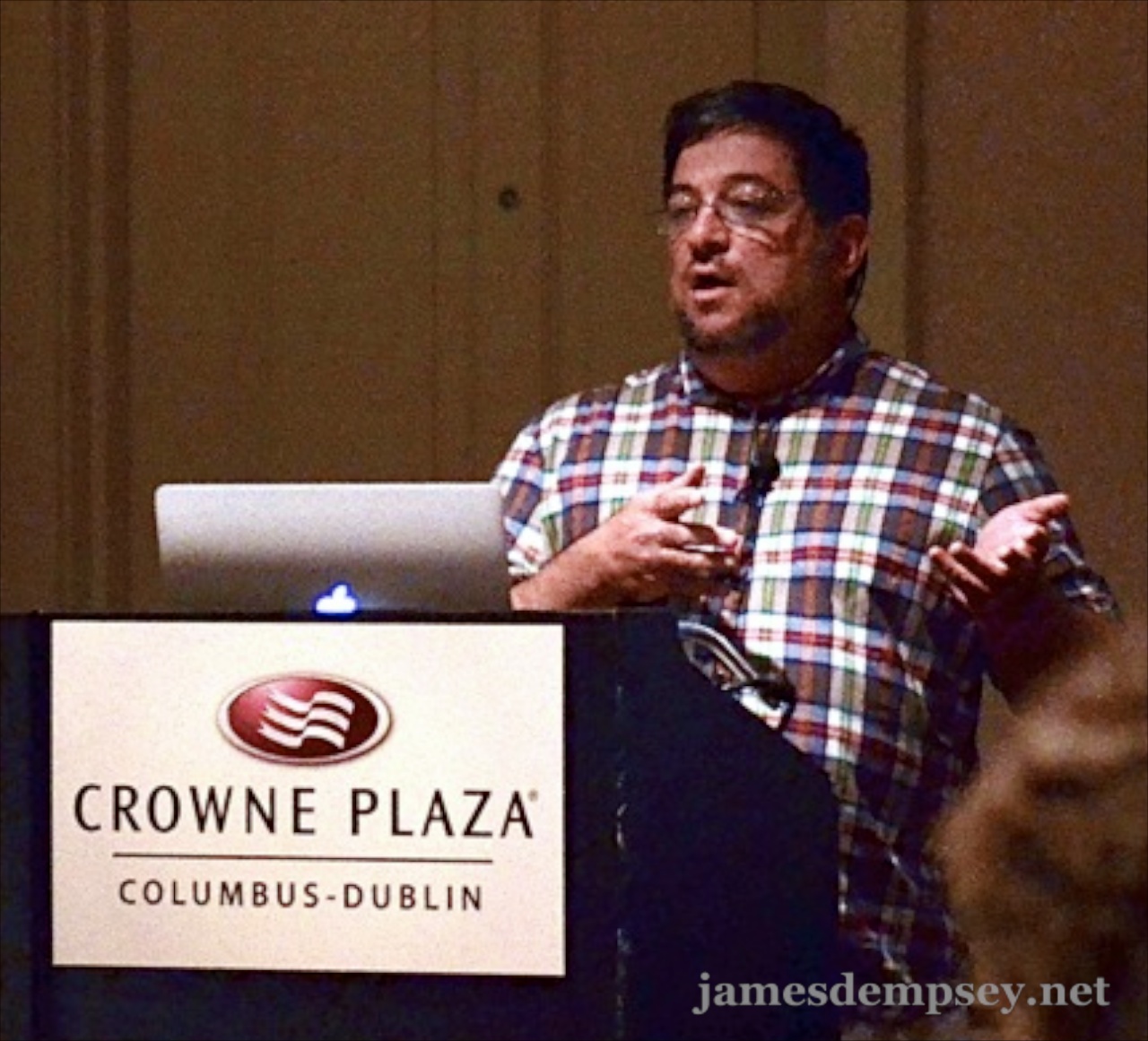 Daniel Steinberg speaking at podium at CocoaConf Columbus