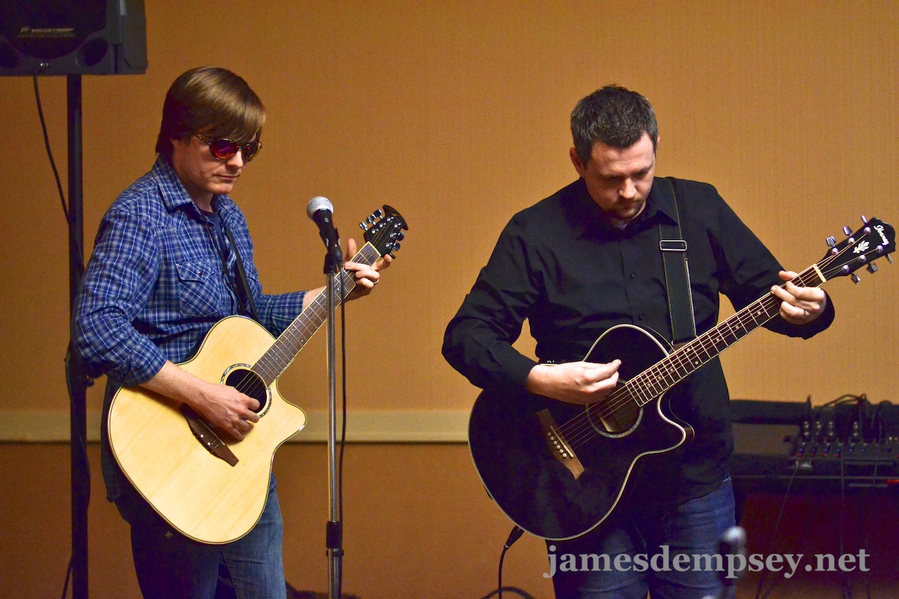 Jonathan Penn and Ben Scheirman playing acoustic guitars
